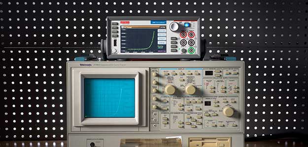 Keithley source measure unit with I-V curve tracer functionality alongside the original I-V curve tracer system from 1955.