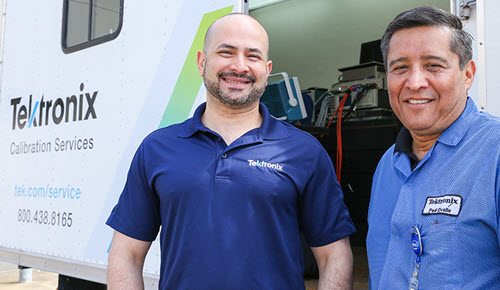 Two Tektronix service representatives. Tektronix is a one-stop calibration services resource