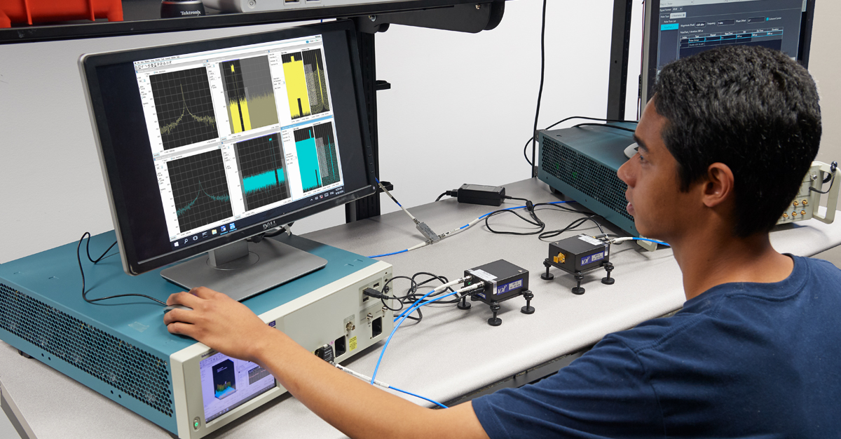 Wideband Oscilloscopes for MIMO radar testing being used by and engineer.