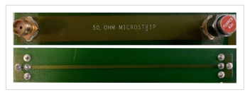 50-ohm microstrip PCB with coaxial connectors.