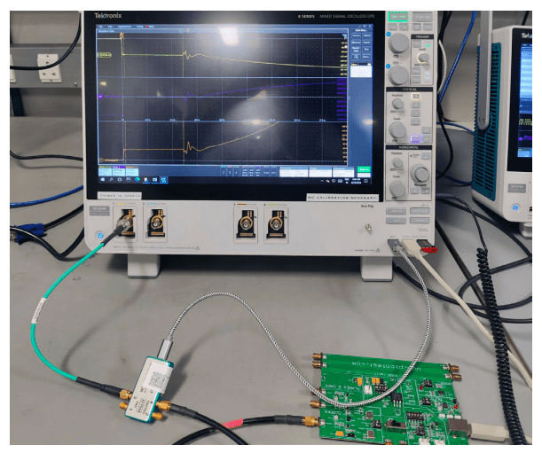 TDR measurement setup with an oscilloscope, probe, and PCB test board connected for signal integrity analysis.