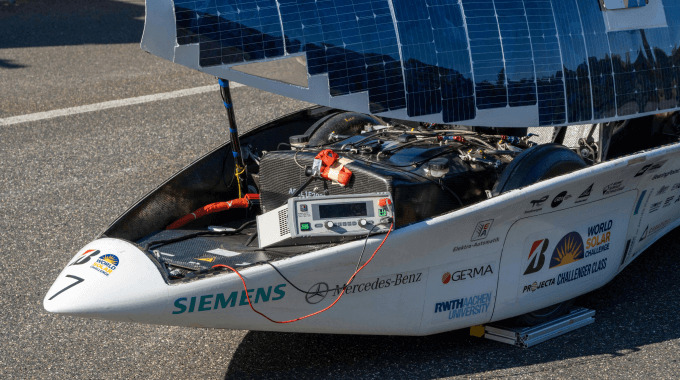 Side profile of the Covestro Adelie solar car undergoing testing with a programmable bi-directional power supply.