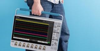 5 Series MSO being carried 5-series-mixed-signal-oscilloscope